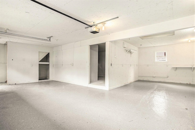 329 N Liberty St, Marshall, MI 49068 - garage featuring a garage door opener