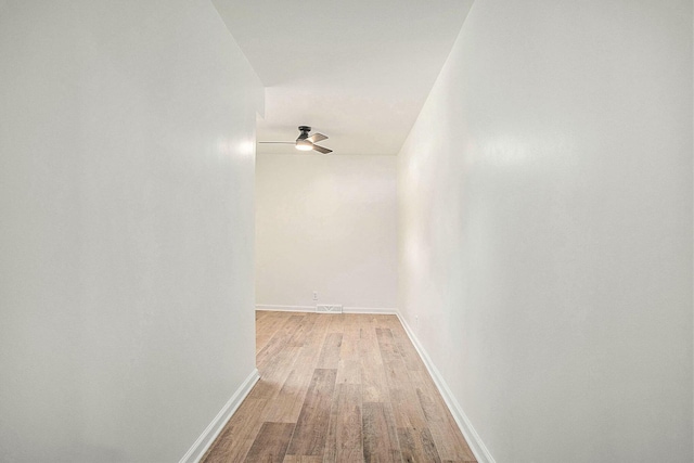 329 N Liberty St, Marshall, MI 49068 - hallway featuring light wood finished floors and baseboards