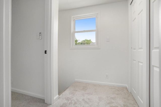 329 N Liberty St, Marshall, MI 49068 - corridor featuring carpet flooring and baseboards