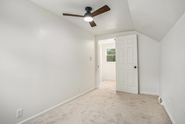 329 N Liberty St, Marshall, MI 49068 - bonus room with lofted ceiling, ceiling fan, light colored carpet, and baseboards