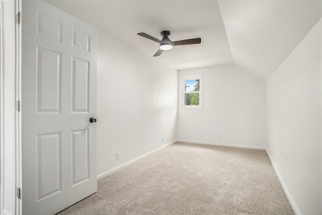 329 N Liberty St, Marshall, MI 49068 - bonus room with light colored carpet, a ceiling fan, vaulted ceiling, and baseboards