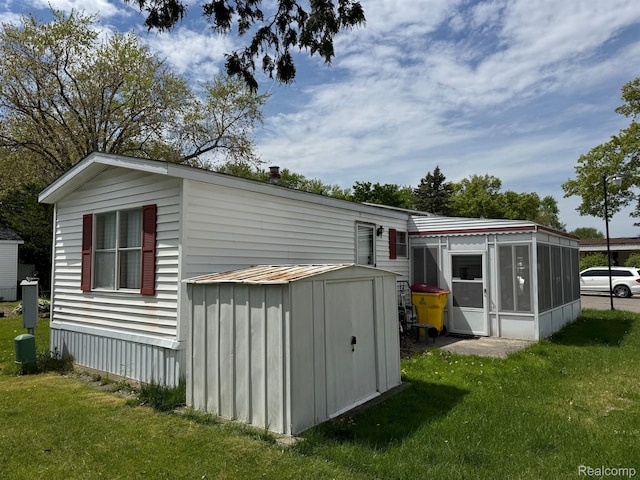 32 3rd St, Dearborn Heights, MI 48127 - view of shed with a sunroom