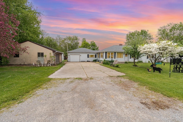 2430 S 4 Mile Rd, Kawkawlin, MI 48631 - ranch-style house featuring driveway and a lawn
