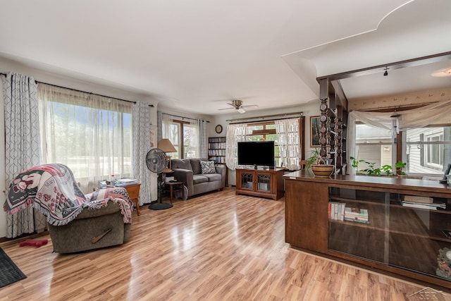 2430 S 4 Mile Rd, Kawkawlin, MI 48631 - living area featuring light wood-type flooring and a ceiling fan