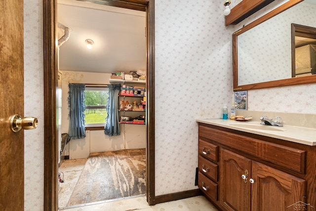 2430 S 4 Mile Rd, Kawkawlin, MI 48631 - bathroom featuring vanity and wallpapered walls