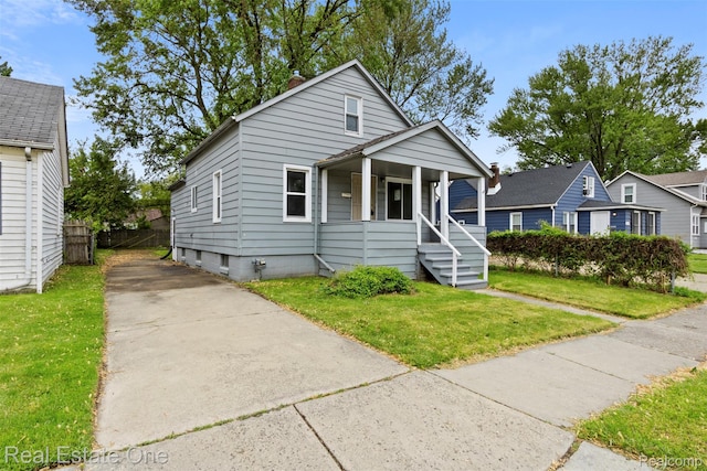 8492 Meadow Ave, Warren, MI 48089 - view of front of property with a porch and driveway