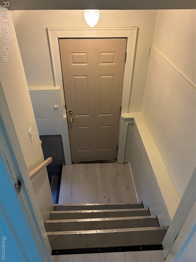 8492 Meadow Ave, Warren, MI 48089 - stairs featuring wood finished floors