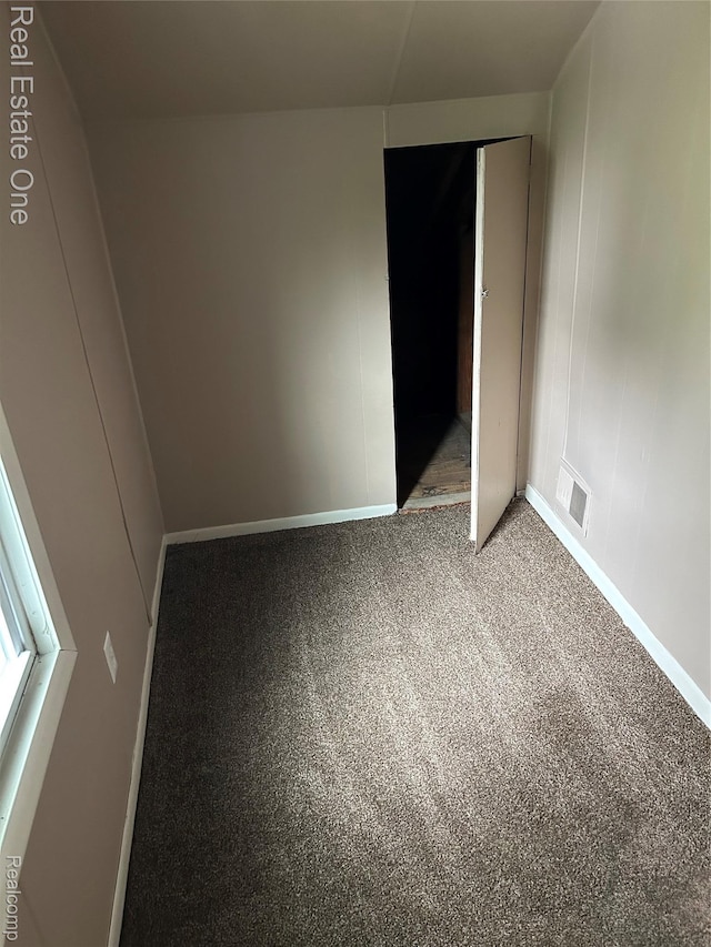 8492 Meadow Ave, Warren, MI 48089 - unfurnished bedroom featuring baseboards, a closet, and carpet flooring