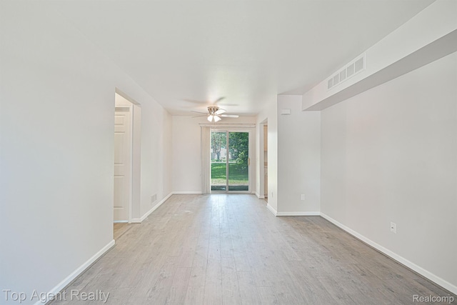 1676 Clemens Cir, Rochester Hills, MI 48307 - empty room featuring wood finished floors, a ceiling fan, and baseboards