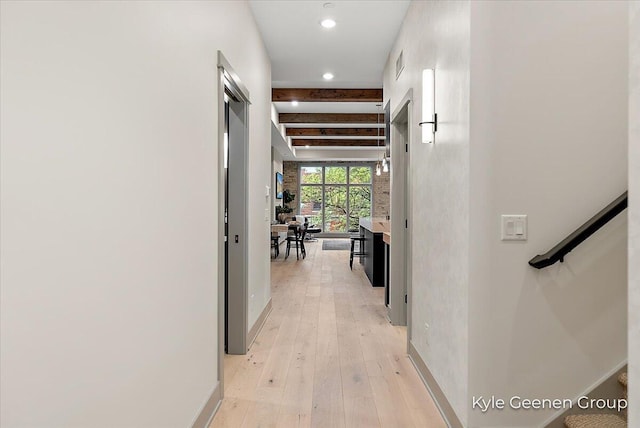 52 E 8th St Ste 210, Holland, MI 49423 - hall with light wood-type flooring, recessed lighting, beam ceiling, and baseboards