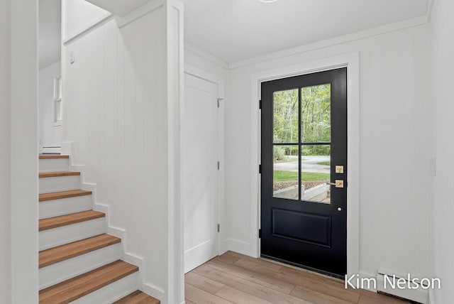 5203 Nestrom Rd, Whitehall, MI 49461 - foyer entrance featuring light wood-style flooring and stairs