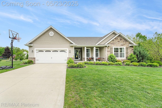 5956 Kerri Ln, Howell, MI 48855 - view of front facade featuring stone siding, an attached garage, a front yard, concrete driveway, and a porch