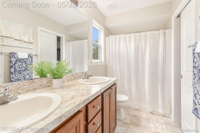 5956 Kerri Ln, Howell, MI 48855 - full bathroom with toilet and double vanity