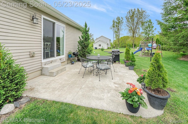 5956 Kerri Ln, Howell, MI 48855 - view of patio / terrace with a playground, a grill, and outdoor dining space