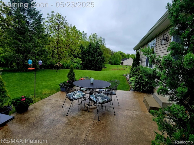 5956 Kerri Ln, Howell, MI 48855 - view of patio / terrace with outdoor dining space