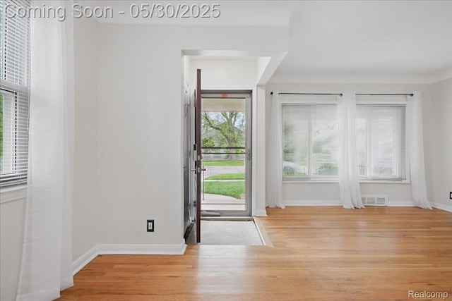 4412 Cooper Ave, Royal Oak, MI 48073 - foyer featuring light wood-style floors and baseboards
