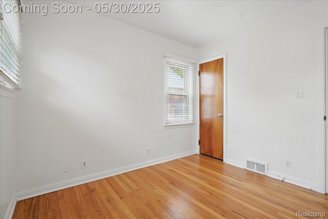 4412 Cooper Ave, Royal Oak, MI 48073 - spare room featuring baseboards and light wood-style flooring