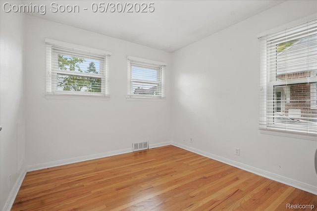 4412 Cooper Ave, Royal Oak, MI 48073 - empty room featuring light wood-type flooring and baseboards