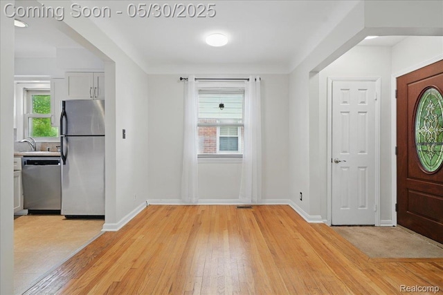 4412 Cooper Ave, Royal Oak, MI 48073 - entryway featuring light wood finished floors and baseboards