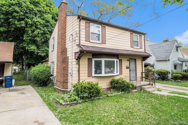 2952 Clement St, Flint, MI 48504 - view of front facade with a chimney
