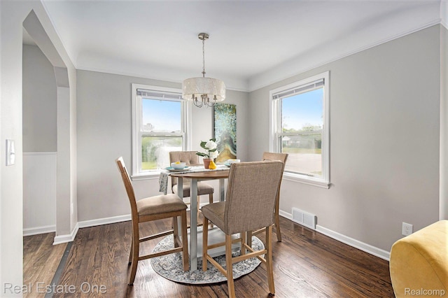 14620 Trenton Rd, Southgate, MI 48195 - dining room with a chandelier, baseboards, dark wood-style floors, and crown molding