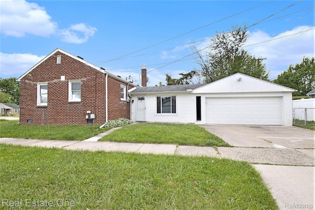 14620 Trenton Rd, Southgate, MI 48195 - view of front of house with brick siding, an attached garage, concrete driveway, and a chimney