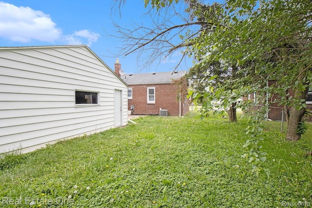 14620 Trenton Rd, Southgate, MI 48195 - view of green lawn featuring cooling unit