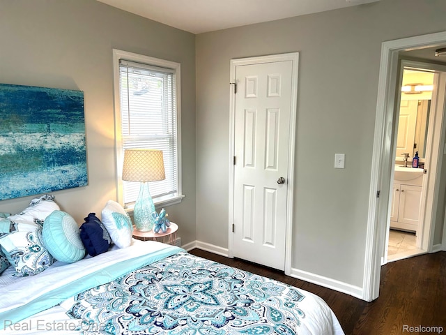 14620 Trenton Rd, Southgate, MI 48195 - bedroom featuring multiple windows, dark wood-style floors, baseboards, and a sink