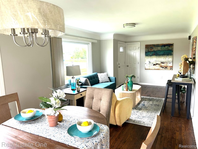14620 Trenton Rd, Southgate, MI 48195 - living area with dark wood finished floors, a chandelier, and baseboards