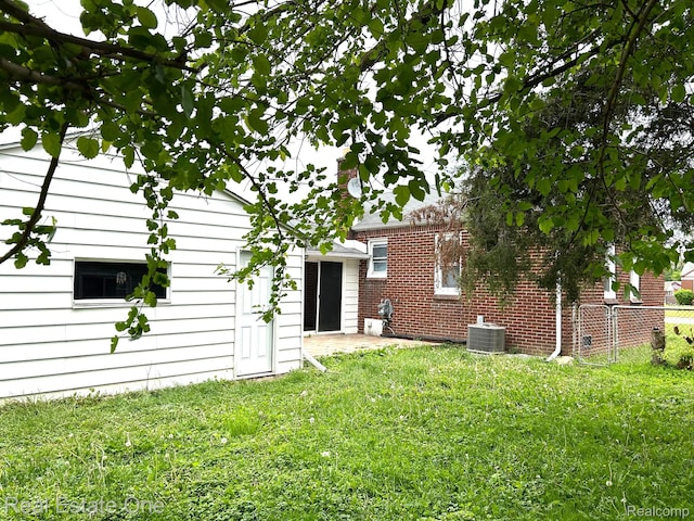 14620 Trenton Rd, Southgate, MI 48195 - rear view of house featuring central AC unit