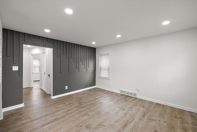 1437 Pearson St, Ferndale, MI 48220 - unfurnished room with baseboards, wood finished floors, and recessed lighting