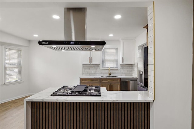 1437 Pearson St, Ferndale, MI 48220 - kitchen featuring island range hood, a sink, dishwasher, gas stovetop, and decorative backsplash
