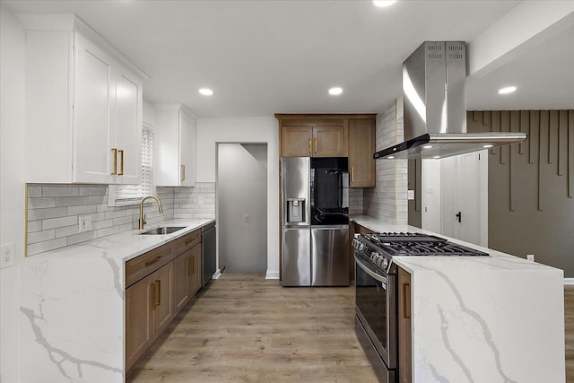 1437 Pearson St, Ferndale, MI 48220 - kitchen featuring range hood, stainless steel appliances, a sink, light wood finished floors, and backsplash