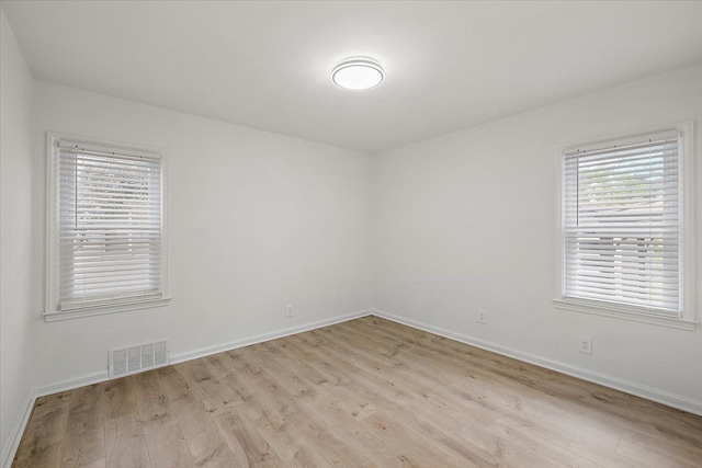 1437 Pearson St, Ferndale, MI 48220 - spare room featuring light wood finished floors and baseboards