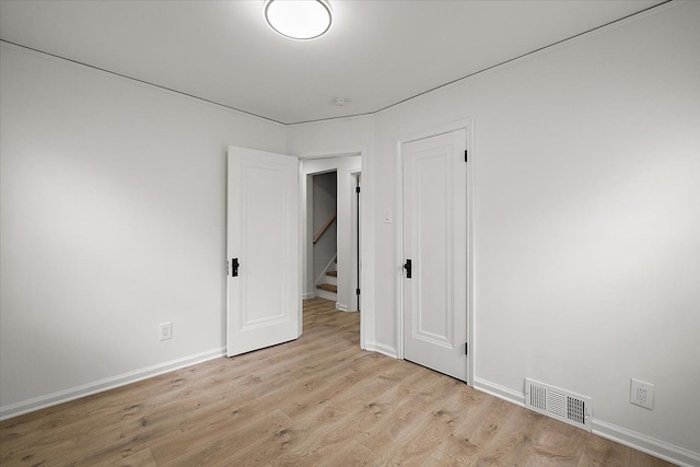 1437 Pearson St, Ferndale, MI 48220 - unfurnished bedroom featuring light wood finished floors and baseboards