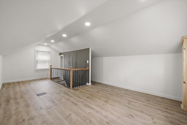 1437 Pearson St, Ferndale, MI 48220 - additional living space featuring lofted ceiling, recessed lighting, wood finished floors, and baseboards
