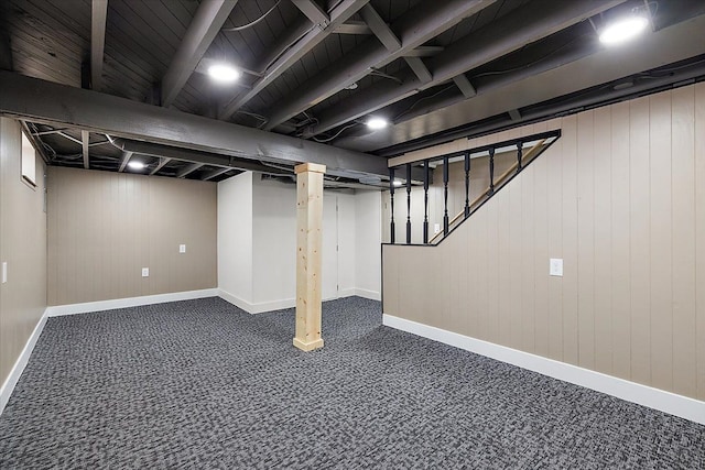 1437 Pearson St, Ferndale, MI 48220 - finished basement with dark carpet, baseboards, and wood walls
