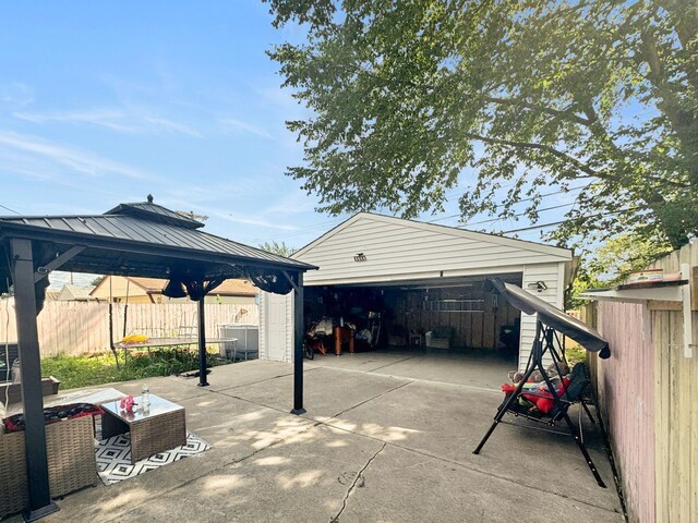 14735 College Ave, Allen Park, MI 48101 - view of car parking with a gazebo and a garage