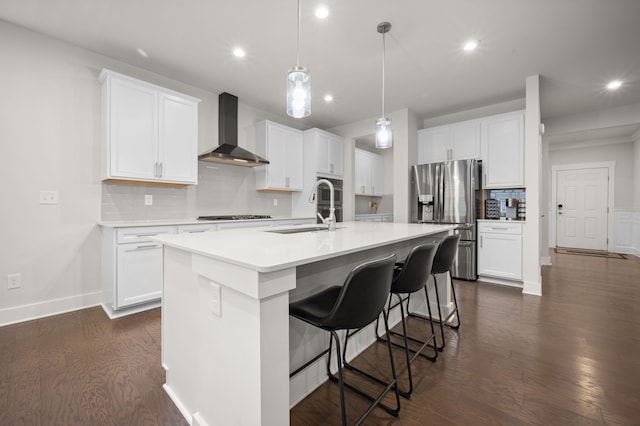 2610 Ironton Dr, Commerce Twp, MI 48382 - kitchen with stainless steel fridge with ice dispenser, wall chimney exhaust hood, a sink, recessed lighting, and dark wood-style floors