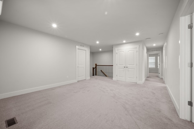 2610 Ironton Dr, Commerce Twp, MI 48382 - below grade area featuring light colored carpet, recessed lighting, and baseboards