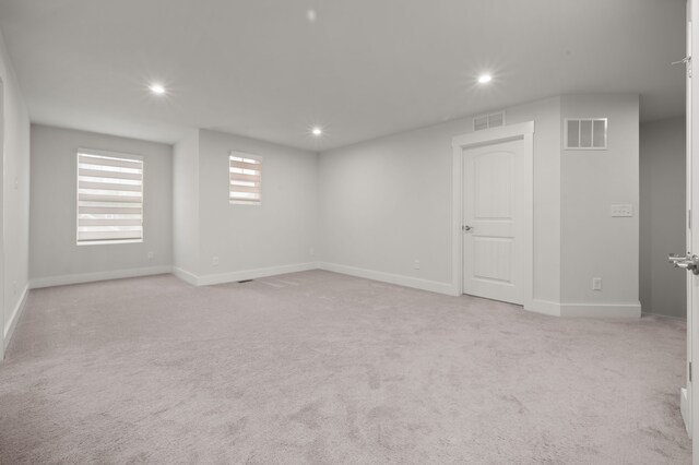 2610 Ironton Dr, Commerce Twp, MI 48382 - unfurnished room with light colored carpet, recessed lighting, and baseboards