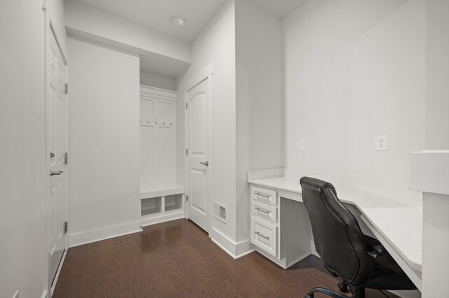 2610 Ironton Dr, Commerce Twp, MI 48382 - office area featuring built in study area, dark wood-style floors, and baseboards