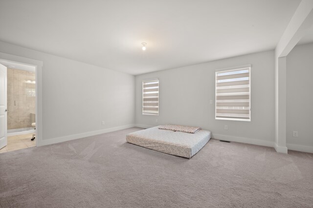2610 Ironton Dr, Commerce Twp, MI 48382 - living area with carpet flooring and baseboards