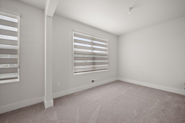 2610 Ironton Dr, Commerce Twp, MI 48382 - unfurnished room featuring carpet and baseboards