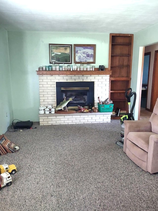 10122 Jones Rd, Bellevue, MI 49021 - carpeted living area featuring a fireplace