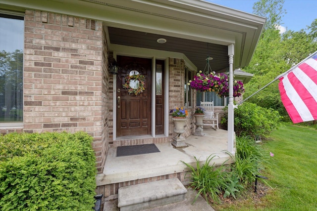3172 Shadow Brook Ln, Pinckney, MI 48169 - property entrance featuring brick siding and covered porch