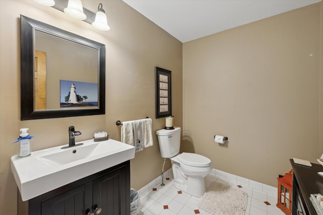 3172 Shadow Brook Ln, Pinckney, MI 48169 - bathroom with vanity, baseboards, toilet, and tile patterned flooring