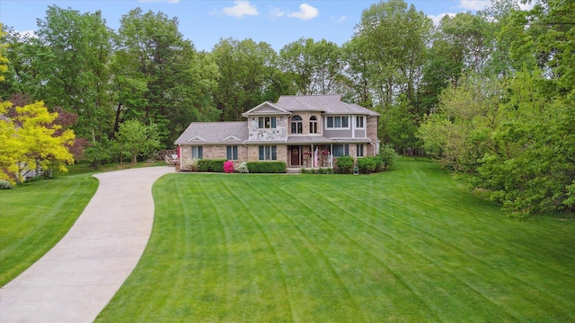 3172 Shadow Brook Ln, Pinckney, MI 48169 - view of front facade with driveway and a front yard