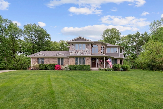 3172 Shadow Brook Ln, Pinckney, MI 48169 - view of front facade featuring a front yard and brick siding