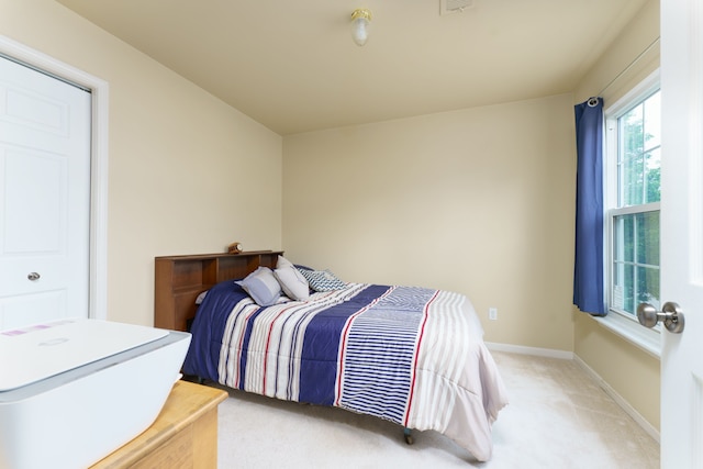 760 Olde English Cir, Howell, MI 48855 - bedroom with light carpet and baseboards